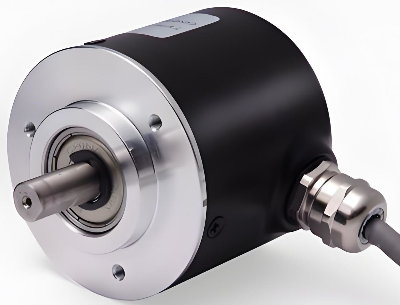 Black cylindrical encoder on white with a metal flange and shaft at the front and a gland cable at the side