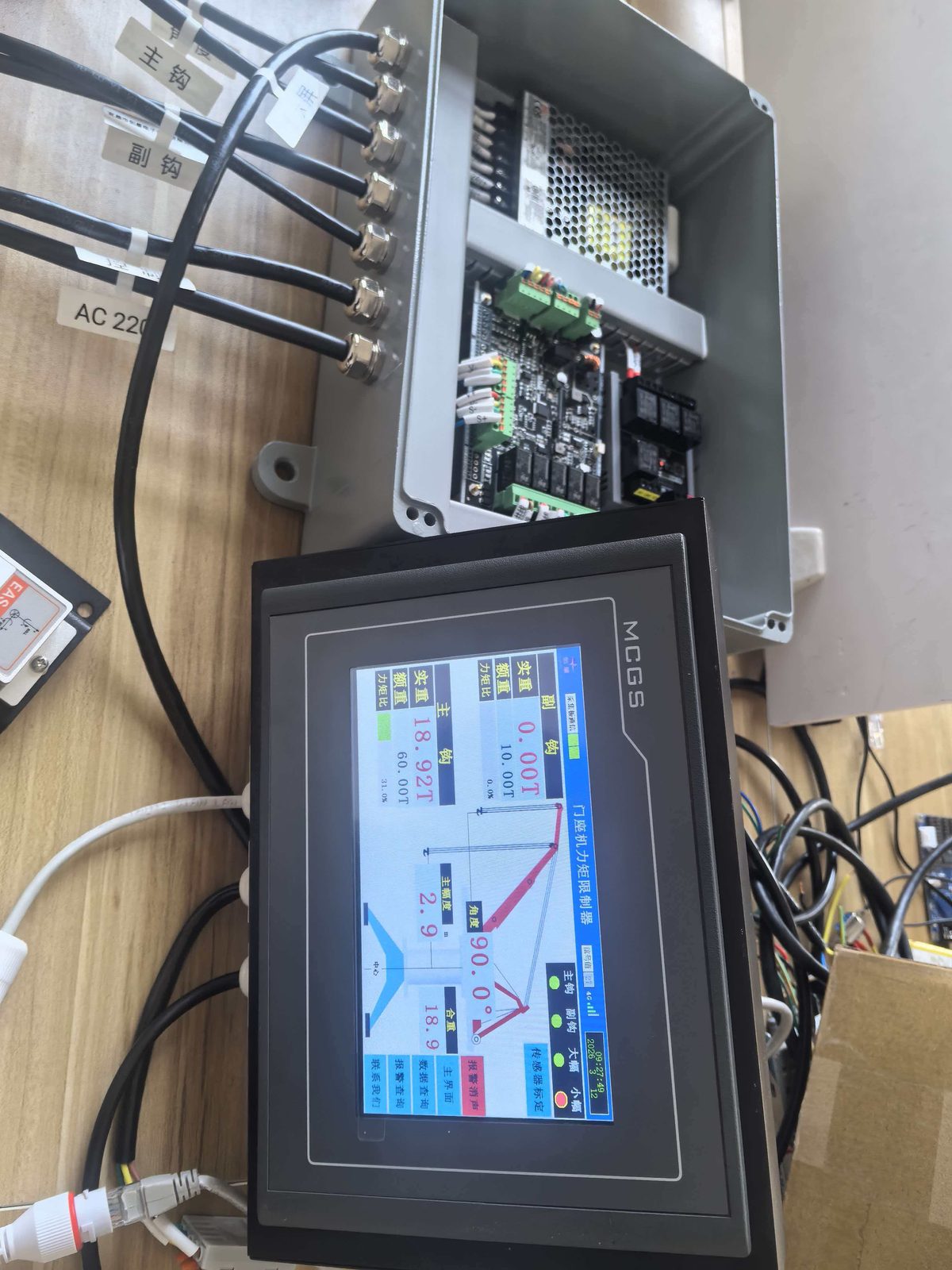 Collector box wired to a terminal running a boom graphic on the bench