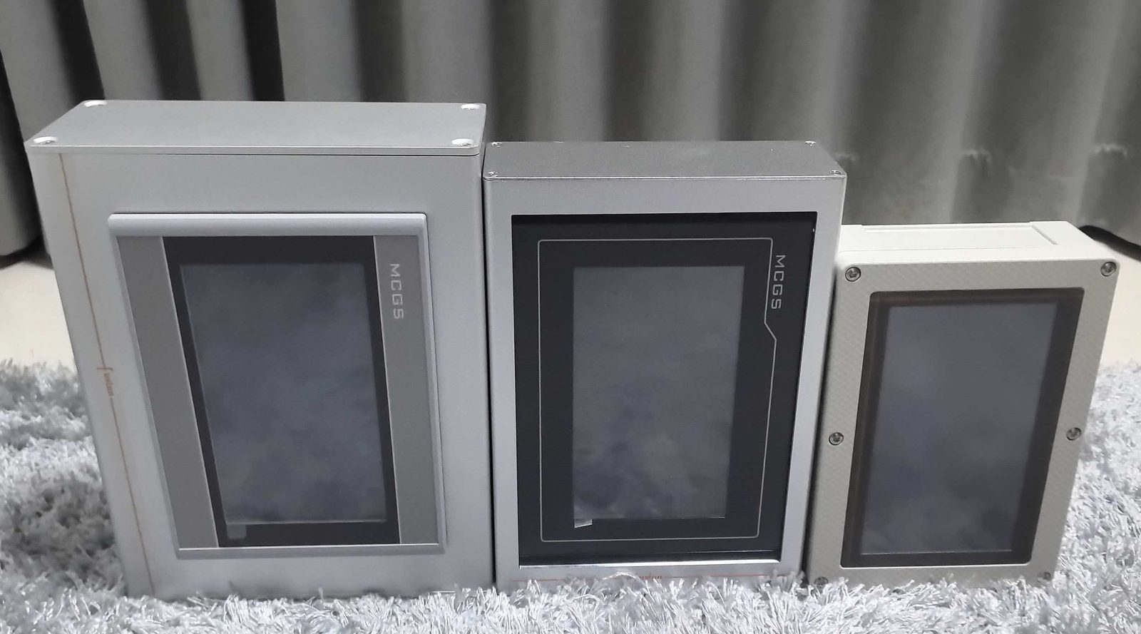 Three terminal faces of different sizes standing on a worktop