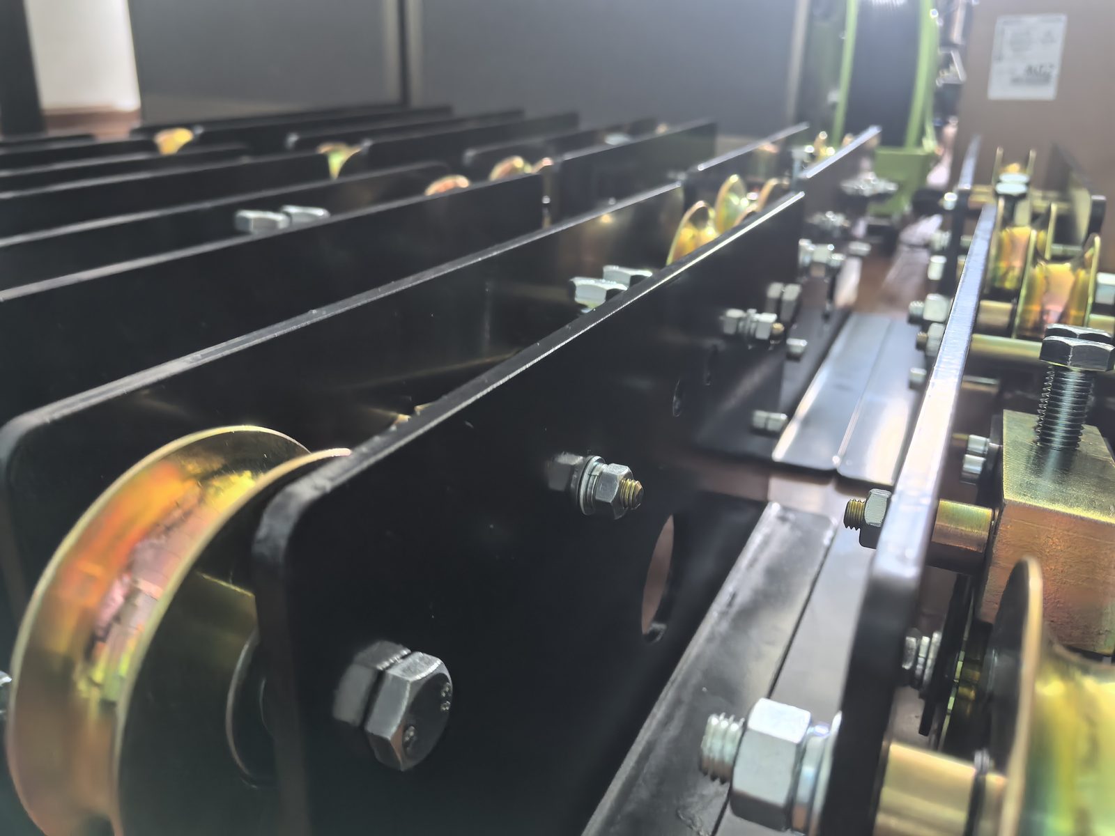 Row of shear beam load cells with yellow elements