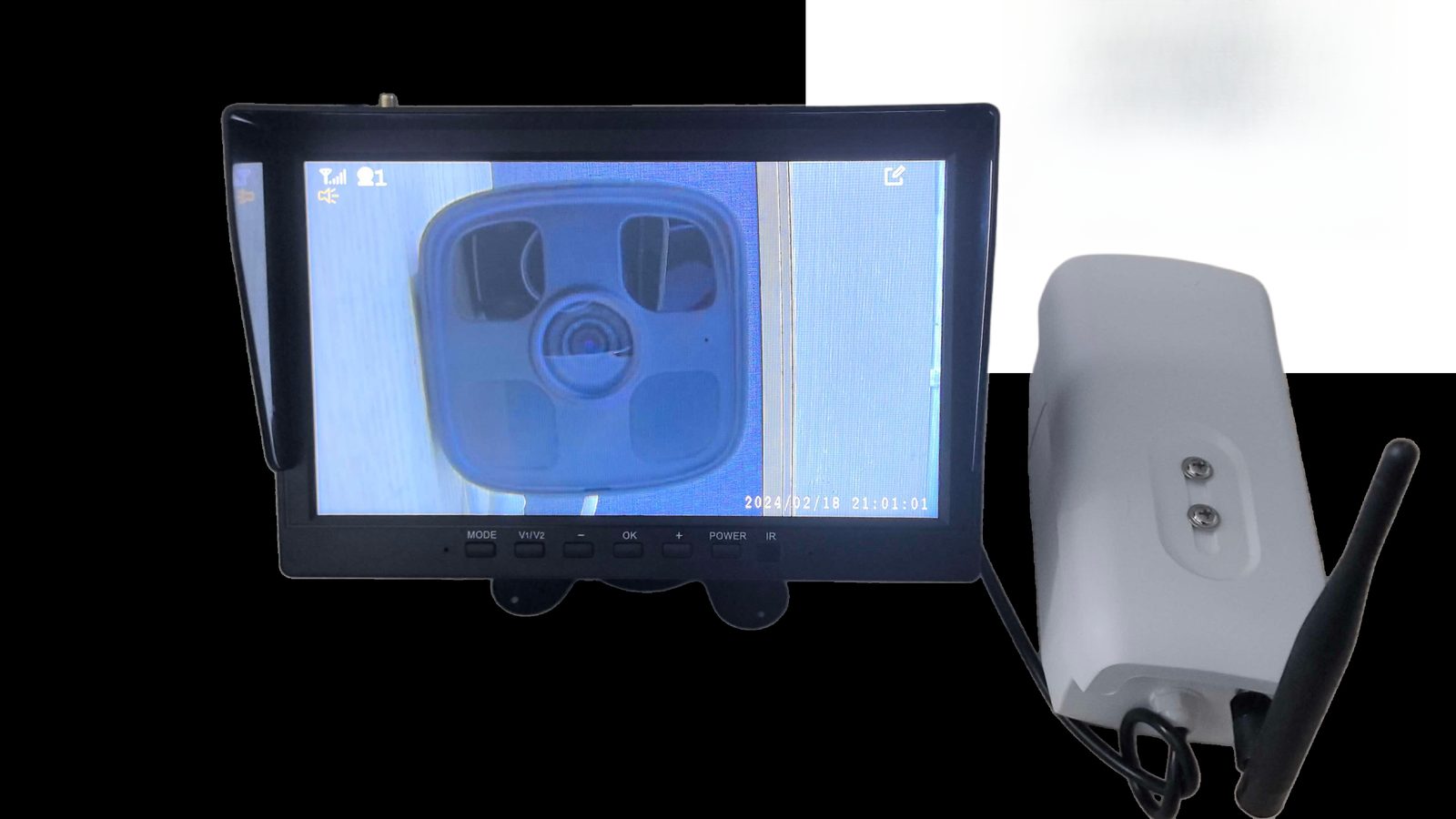 Cab monitor beside a wireless bridge unit with antenna