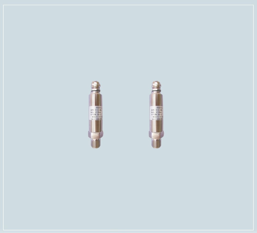 Two cylindrical hydraulic pressure transmitters
